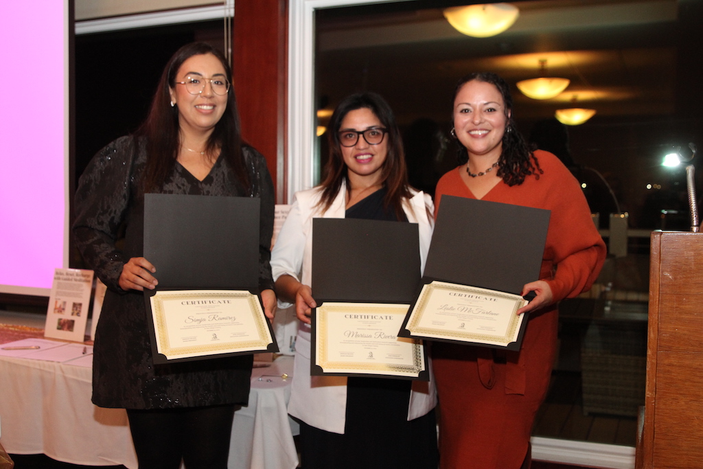 LEC Scholarship Recipients Simja Ramirez, Marissa Rivera, and Leslie McFarlane being recognized at the 2022 Liquid Gold Gala